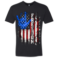 A black t-shirt with a patriotic design of a vertical American flag with red and white horizontal stripes, with a blue ASL "I Love You" signing hand behind a cluster of stars.  The text design says "Freedom" in white.