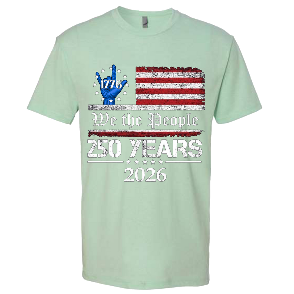 A Mint Green t-shirt with a patriotic design.  An American flag with red and white horizontal stripes, with a blue ASL "I Love You" signing hand with a circle of stars.  The text design says "We The People" and "250 Years 2026" in white.