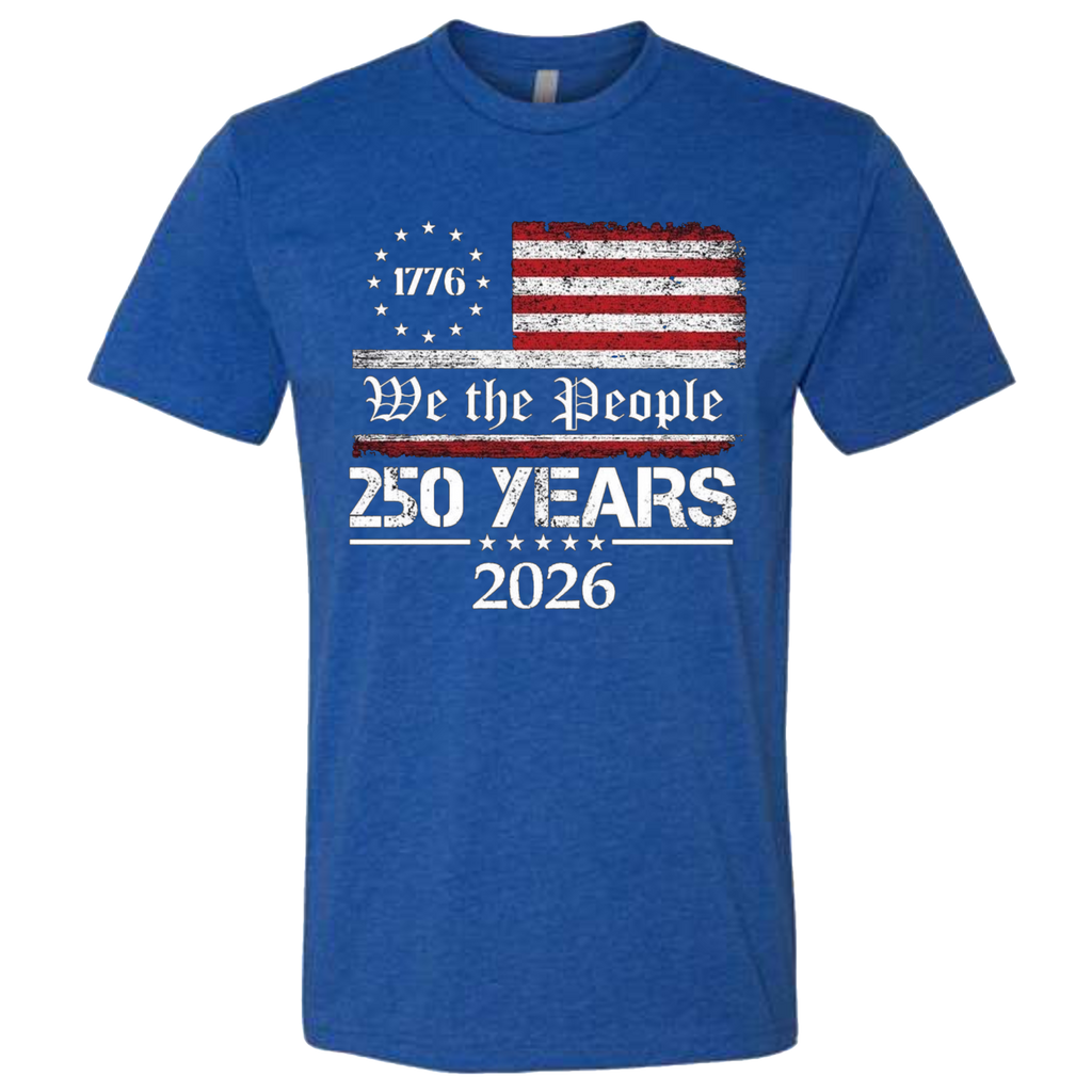A Royal Blue t-shirt with a patriotic design.  An American flag with red and white horizontal stripes, with a circle of stars.  The text design says "We The People" and "250 Years 2026" in white.